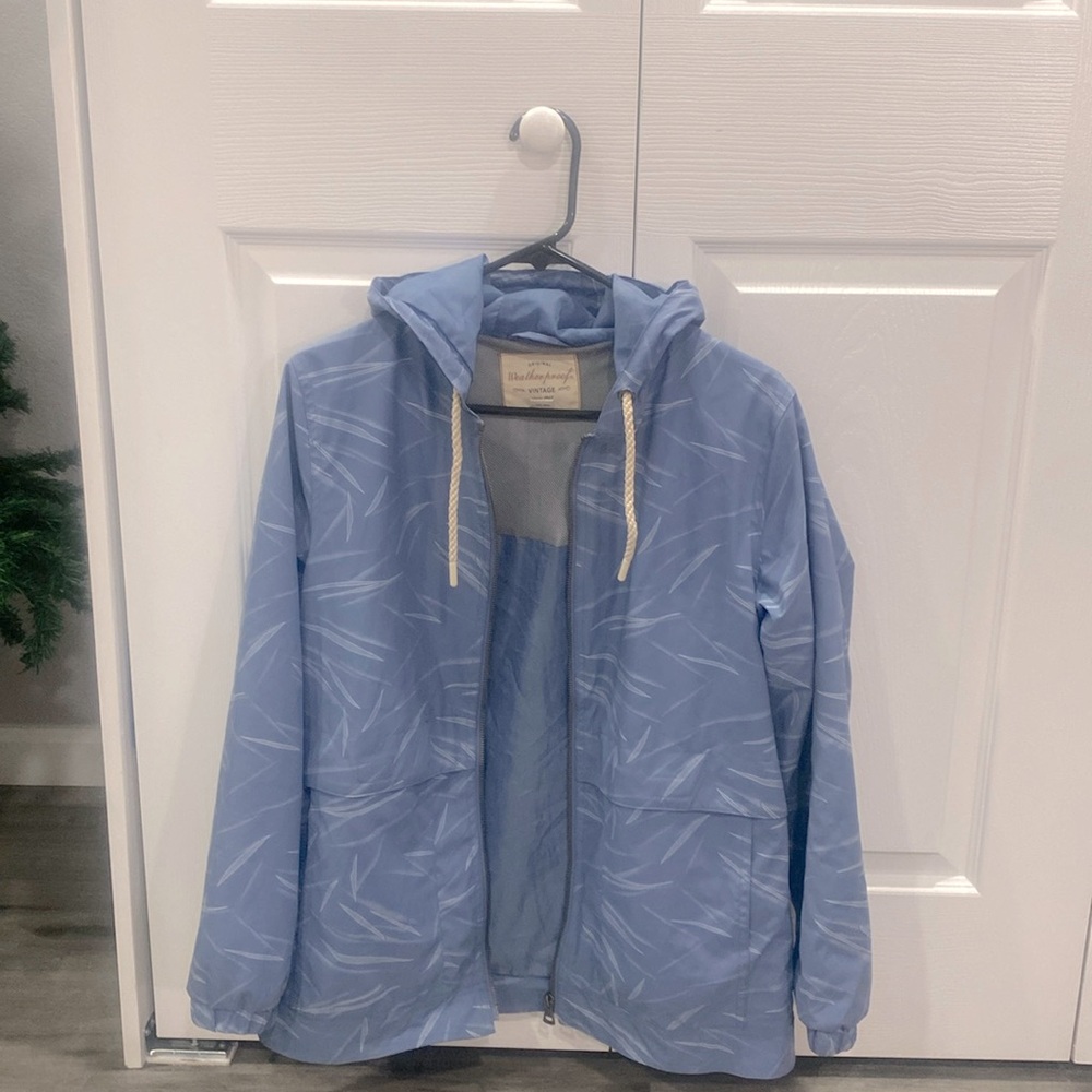 A blue raincoat.